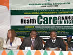 The Deputy Governor of Akwa Ibom State, Mr. Nsima Ekere (r), flanked from his right by the State Commissioner for Health, Dr. Bassey Antai; and the State Commissioner for Science and Technology, Barr. Comfort Etuk, during the 2012 Annual General Meeting/S