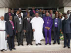 Akwa Ibom Governor Godswill Akpabio (middle in white), his deputy, Mr. Nsima Ekere (to his right) and CAN National President, Pastor Ayo Oritsejafor in a group photograph with the National Exco CAN in Government House, Uyo