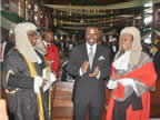The Deputy Governor of Akwa Ibom State, Mr. Nsima Ekere (c), flanked by the State Chief Judge, Justice Idongesit Ntem Isua (r) and State Attorney-General and Commissioner for Justice, Chief Assam Assam SAN (l), during the opening of the 2011/2012 Legal Ye