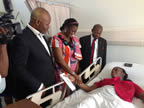 Mrs Unoma Godswill Akpabio, wife of the Akwa Ibom State Governor,(middle) presenting a gift to the independence baby at St Kitts General Hospital, as part of activities marking the 30th Independence anniversary celebrations of St Kitts and Nevis, while Akwa Ibom State Governor, His Excellency Sir (Dr.) Godswill Akpabio (CON), and Prime Minister of St Kitts and Nevis, Rt. Hon. Dr. Denzil Douglas,  watch with admiration.